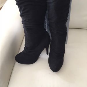 Black high heeled slouch boots